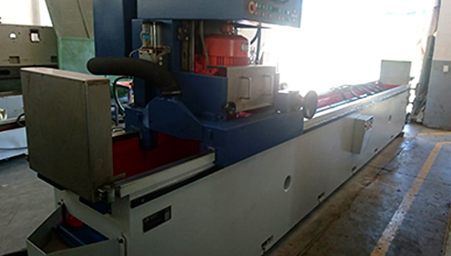 The same Reform knife grinder after reconditioning: rebuilt grinding head, new guards and clean paint