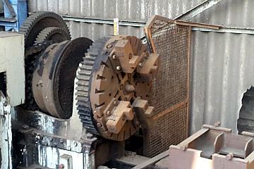 The Hulse centre lathe as it arrived: rusted bed, faceplate and gear train